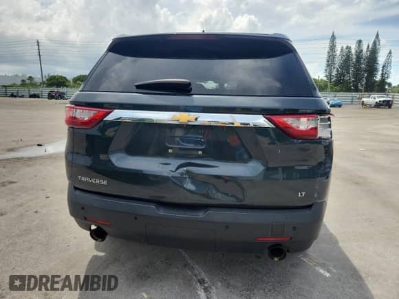 2018 Chevrolet Traverse LT с VIN 1GNERHKWXJJ169067, выставлен на аукционе Copart как лот 69813785 с пробегом 174 248 миль миль и Списание • Salvage title. История ставок и продаж доступна на DreamBid. Изображение 6.