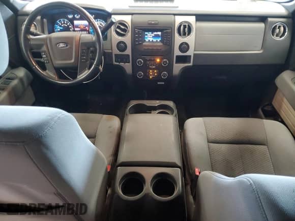 2013 Ford F-150 Lariat with VIN 1FTFW1ETXDKE18948, listed as a Copart auction lot 70455185 with 205,335 mi miles and Salvage title. Bid and sale history available at DreamBid. Image 8.