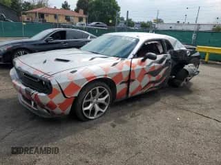 2015 Dodge Challenger SXT Plus с VIN 2C3CDZBG9FH724150, выставлен на аукционе Copart как лот 65074235 с пробегом 130 354 миль миль и Списание • Salvage title. История ставок и продаж доступна на DreamBid. Изображение 1.