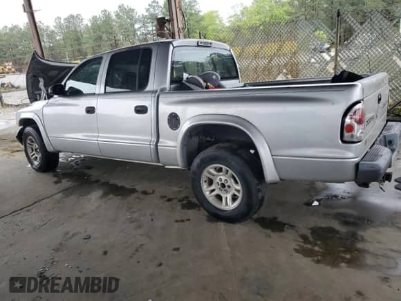 2004 Dodge Dakota Sport с VIN 1D7HL38K74S570546, выставлен на аукционе Copart как лот 49627955 с пробегом 237 321 миль миль и Списание • Salvage title. История ставок и продаж доступна на DreamBid. Изображение 2.
