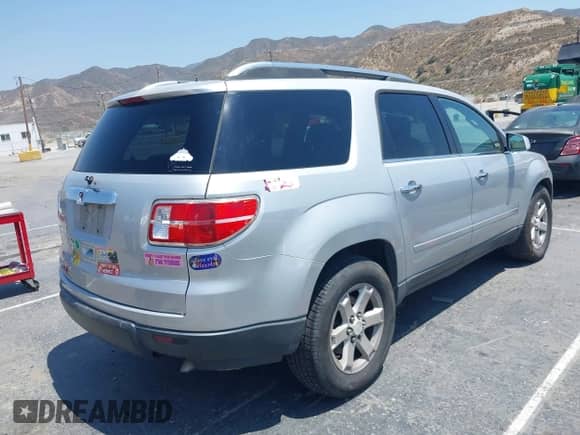 2009 Saturn Outlook XR with VIN 5GZER23D09J101146, listed as a IAAI auction lot 42588785 with 182,996 mi miles and . Bid and sale history available at DreamBid. Image 4.
