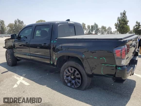 2021 Toyota Tacoma Limited with VIN 3TYGZ5AN8MT038529, listed as a Copart auction lot 58527975 with 46,147 mi miles and Salvage title. Bid and sale history available at DreamBid. Image 2.