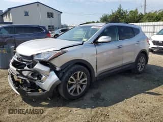 2014 Hyundai Santa Fe with VIN 5XYZU3LA6EG141870, listed as a Copart auction lot 89644685 with 136,917 mi miles and Clean title. Bid and sale history available at DreamBid. Image 1.