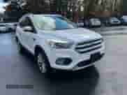 2017 Ford Escape Titanium with VIN 1FMCU9JD7HUE28039, listed as a Copart auction lot 89850105 with 107,762 mi miles and Clean title. Bid and sale history available at DreamBid. Image 4.