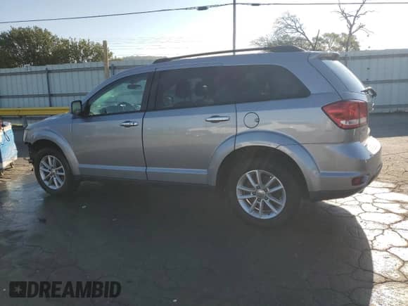 2016 Dodge Journey SXT with VIN 3C4PDCBG9GT224413, listed as a Copart auction lot 84042885 with 201,889 mi miles and Salvage title. Bid and sale history available at DreamBid. Image 2.