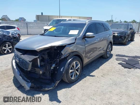 2019 Kia Sorento EX with VIN 5XYPH4A52KG472996, listed as a IAAI auction lot 42292670 with 120,767 mi miles and . Bid and sale history available at DreamBid. Image 2.