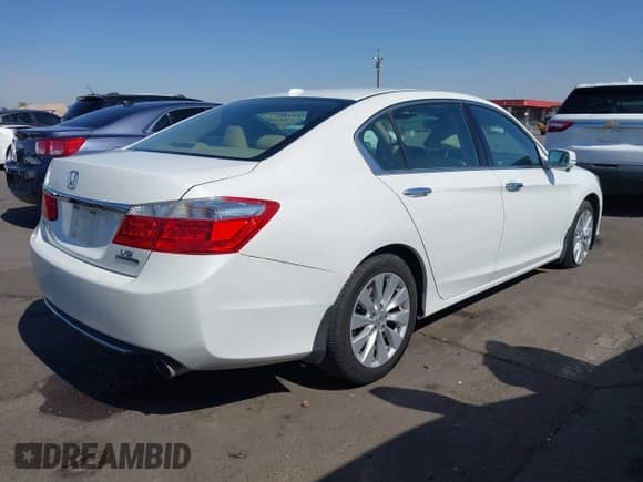 2015 Honda Accord Touring z VIN 1HGCR3F90FA000028, wystawiony jako IAAI lot #42353710 z przebiegiem 119 387 mil mil oraz . Historia ofert i sprzedaży dostępna na DreamBid. Obrazek 4.