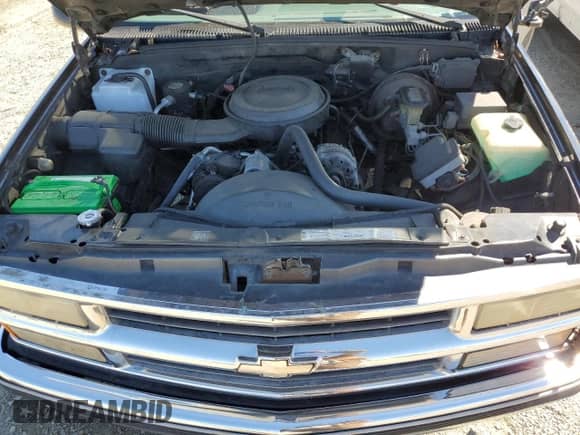 1995 Chevrolet Tahoe z VIN 1GNEC13K0SJ458724, wystawiony jako Copart lot #70678714 z przebiegiem 254 607 mil mil oraz Szkoda całkowita • Salvage title. Historia ofert i sprzedaży dostępna na DreamBid. Obrazek 12.