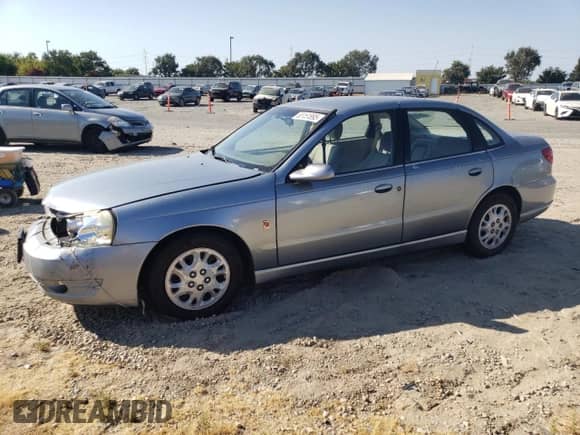 2003 Saturn LS with VIN 1G8JU54F63Y501575, listed as a Copart auction lot 65151895 with Not provided miles and Salvage title. Bid and sale history available at DreamBid. Image 1.