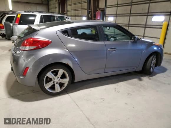 2014 Hyundai Veloster с VIN KMHTC6ADXEU204681, выставлен на аукционе Copart как лот 90672405 с пробегом 99 196 миль миль и Чистый • Clean title. История ставок и продаж доступна на DreamBid. Изображение 3.