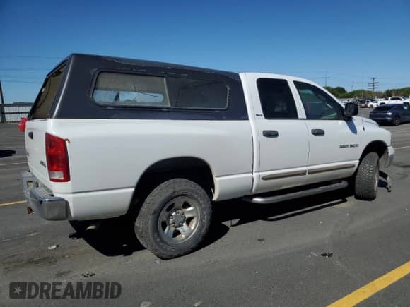2002 Dodge RAM z VIN 3D3HU18ZX2G184093, wystawiony jako Copart lot #64220995 z przebiegiem 152 751 mil mil oraz Szkoda całkowita • Salvage title. Historia ofert i sprzedaży dostępna na DreamBid. Obrazek 3.