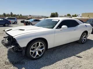 2015 Dodge Challenger SXT Plus с VIN 2C3CDZBG4FH702699, выставлен на аукционе Copart как лот 80221825 с пробегом 157 548 миль миль и Списание • Salvage title. История ставок и продаж доступна на DreamBid. Изображение 1.