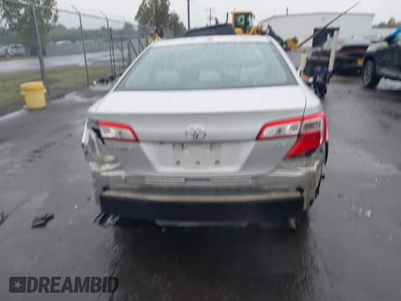 2014 Toyota Camry LE with VIN 4T4BF1FK4ER401493, listed as a IAAI auction lot 43303455 with 183,665 mi miles and . Bid and sale history available at DreamBid. Image 16.