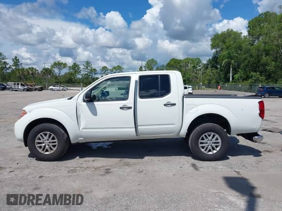 2017 Nissan Frontier SV with VIN 1N6DD0ER5HN713825, listed as a IAAI auction lot 43064115 with 189,413 mi miles and . Bid and sale history available at DreamBid. Image 14.