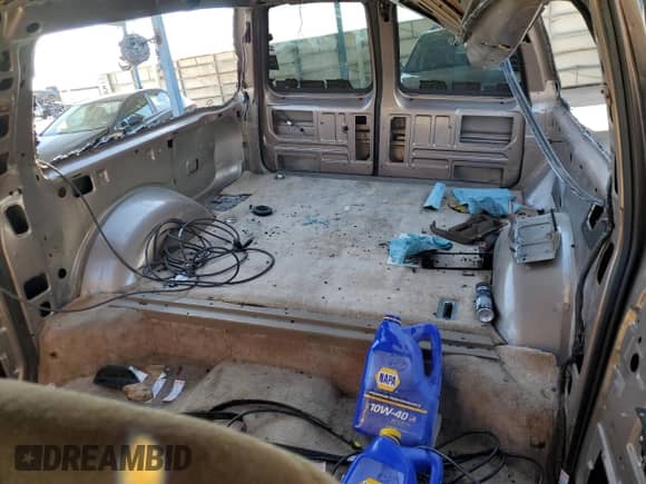 1994 Chevrolet Suburban with VIN 1GNEC16K0RJ411599, listed as a Copart auction lot 73436004 with 273,785 mi miles and Salvage title. Bid and sale history available at DreamBid. Image 10.