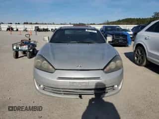 2008 Hyundai Tiburon GS с VIN KMHHM66D38U286530, выставлен на аукционе Copart как лот 80779474 с пробегом 258 212 миль миль и Списание • Salvage title. История ставок и продаж доступна на DreamBid. Изображение 5.