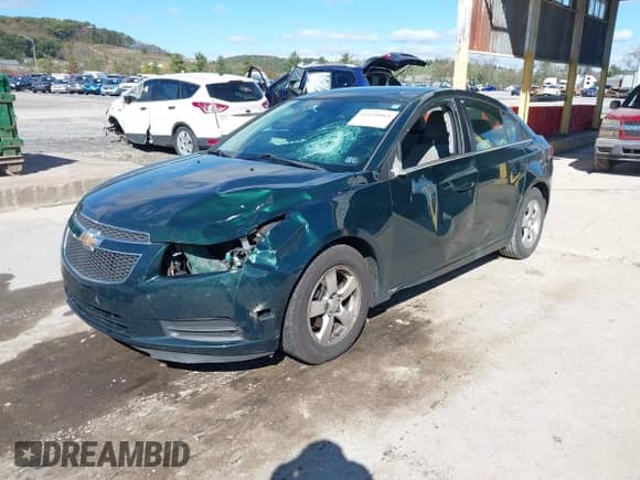 2014 Chevrolet Cruze 1LT с VIN 1G1PC5SB4E7209685, выставлен на аукционе IAAI как лот 43410064 с пробегом 167 817 миль миль и . История ставок и продаж доступна на DreamBid. Изображение 2.