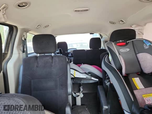 2014 Dodge Grand Caravan SXT with VIN 2C4RDGCG3ER244770, listed as a Copart auction lot 61854205 with Not provided miles and Salvage title. Bid and sale history available at DreamBid. Image 10.
