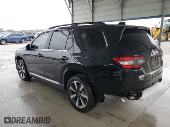 2025 Honda Pilot Touring с VIN 5FNYG1H74SB137761, выставлен на аукционе Copart как лот 70340305 с пробегом 946 миль миль и Списание • Salvage title. История ставок и продаж доступна на DreamBid. Изображение 2.