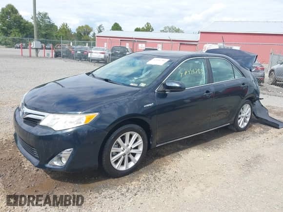 2014 Toyota Camry LE z VIN 4T1BD1FK7EU103357, wystawiony jako IAAI lot #42996785 z przebiegiem 99 532 mil mil oraz . Historia ofert i sprzedaży dostępna na DreamBid. Obrazek 2.