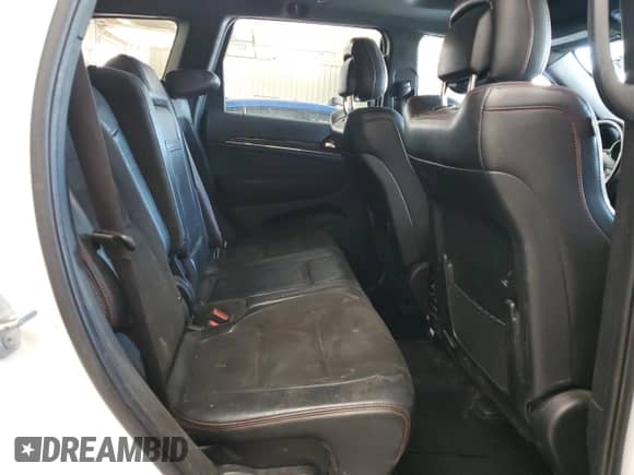 2021 Jeep Grand Cherokee Trailhawk z VIN 1C4RJFLG0MC868410, wystawiony jako Copart lot #63120925 z przebiegiem 140 986 mil mil oraz Czysty tytuł • Clean title. Historia ofert i sprzedaży dostępna na DreamBid. Obrazek 11.