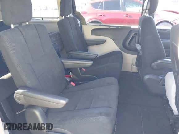2013 Dodge Grand Caravan SXT with VIN 2C4RDGCG5DR601476, listed as a IAAI auction lot 43399330 with 142,142 mi miles and . Bid and sale history available at DreamBid. Image 8.