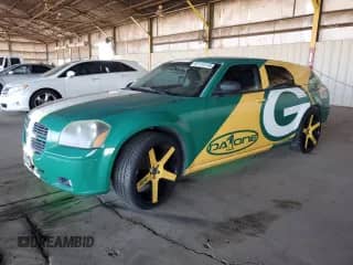 2005 Dodge Magnum SE with VIN 2D4FV48V15H570095, listed as a Copart auction lot 87114115 with 203,321 mi miles and Salvage title. Bid and sale history available at DreamBid. Image 1.