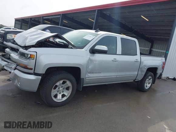 2017 Chevrolet Silverado 1500 LT with VIN 3GCUKREC0HG456350, listed as a IAAI auction lot 43325671 with 152,647 mi miles and . Bid and sale history available at DreamBid. Image 15.