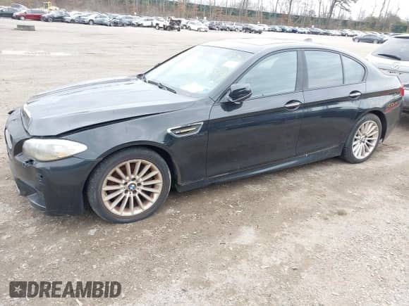 2012 BMW 5 Series 550i xDrive with VIN WBAFU9C55CC786985, listed as a IAAI auction lot 42025402 with Not provided miles and . Bid and sale history available at DreamBid. Image 2.