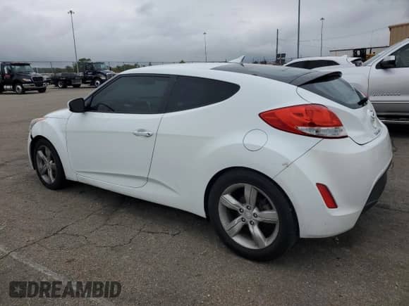 2015 Hyundai Veloster z VIN KMHTC6ADXFU226603, wystawiony jako Copart lot #83825545 z przebiegiem 136 233 mil mil oraz Szkoda całkowita • Salvage title. Historia ofert i sprzedaży dostępna na DreamBid. Obrazek 2.