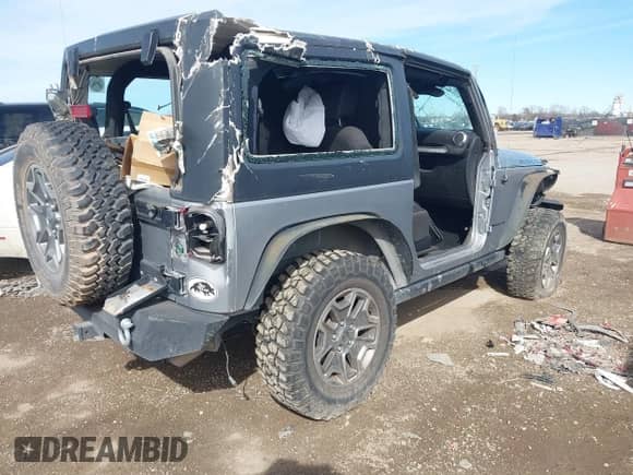 2015 Jeep Wrangler Rubicon with VIN 1C4BJWCG0FL675520, listed as a IAAI auction lot 41672867 with 42,842 mi miles and . Bid and sale history available at DreamBid. Image 4.