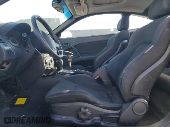 2008 Hyundai Tiburon GS с VIN KMHHM66D18U290091, выставлен на аукционе Copart как лот 42155375 с пробегом 141 681 миль миль и Списание • Salvage title. История ставок и продаж доступна на DreamBid. Изображение 7.