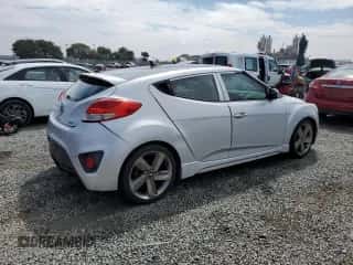 2013 Hyundai Veloster Turbo z VIN KMHTC6AE7DU173199, wystawiony jako Copart lot #81507235 z przebiegiem 134 071 mil mil oraz Szkoda całkowita • Salvage title. Historia ofert i sprzedaży dostępna na DreamBid. Obrazek 3.