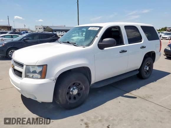 2013 Chevrolet Tahoe Commercial z VIN 1GNSK2E09DR349030, wystawiony jako Copart lot #69140325 z przebiegiem 163 621 mil mil oraz Czysty tytuł • Clean title. Historia ofert i sprzedaży dostępna na DreamBid. Obrazek 1.