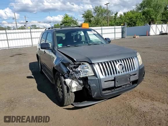 2008 Mercury Mariner Premier with VIN 4M2CU971X8KJ35114, listed as a Copart auction lot 70386905 with 148,184 mi miles and Salvage title. Bid and sale history available at DreamBid. Image 14.