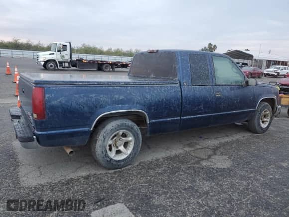 1995 GMC Sierra 1500 z VIN 2GTEC19K0S1537997, wystawiony jako Copart lot #85018174 z przebiegiem 240 831 mil mil oraz Czysty tytuł • Clean title. Historia ofert i sprzedaży dostępna na DreamBid. Obrazek 3.