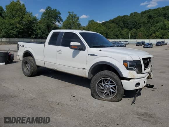 2014 Ford F-150 XL с VIN 1FTFX1EF2EFC76659, выставлен на аукционе Copart как лот 68811355 с пробегом 162 258 миль миль и Списание • Salvage title. История ставок и продаж доступна на DreamBid. Изображение 4.