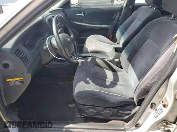 2004 Hyundai Sonata z VIN KMHWF25S44A002313, wystawiony jako Copart lot #63228375 z przebiegiem 165 208 mil mil oraz Szkoda całkowita • Salvage title. Historia ofert i sprzedaży dostępna na DreamBid. Obrazek 7.