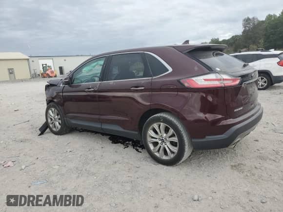 2019 Ford Edge Titanium with VIN 2FMPK4K9XKBB70858, listed as a Copart auction lot 85197985 with 88,408 mi miles and Salvage title. Bid and sale history available at DreamBid. Image 2.