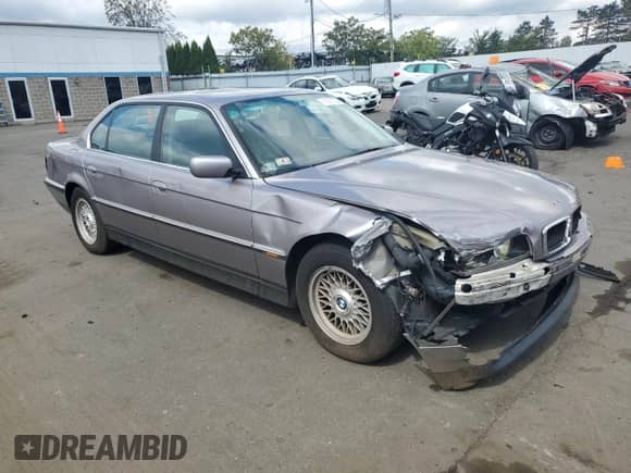 1998 BMW 7 Series 740iL with VIN WBAGJ8328WDM22538, listed as a Copart auction lot 70917325 with Not provided miles and Salvage title. Bid and sale history available at DreamBid. Image 4.