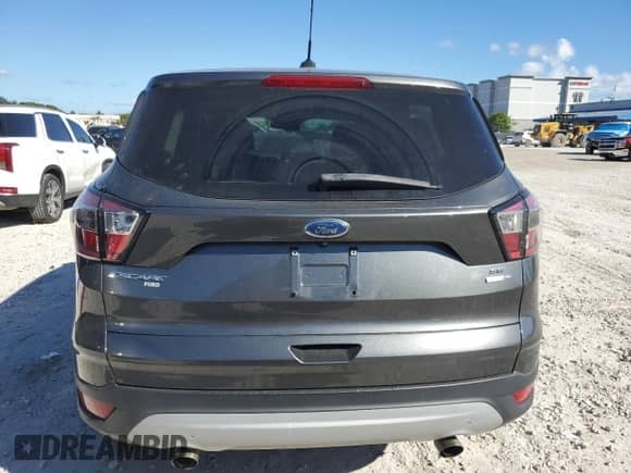 2017 Ford Escape SE z VIN 1FMCU9GD3HUC39198, wystawiony jako Copart lot #90023225 z przebiegiem 150 567 mil mil oraz Czysty tytuł • Clean title. Historia ofert i sprzedaży dostępna na DreamBid. Obrazek 6.