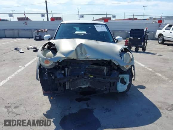 2007 MINI Hardtop with VIN WMWMF33537TT55761, listed as a IAAI auction lot 43072021 with 190,545 mi miles and . Bid and sale history available at DreamBid. Image 13.