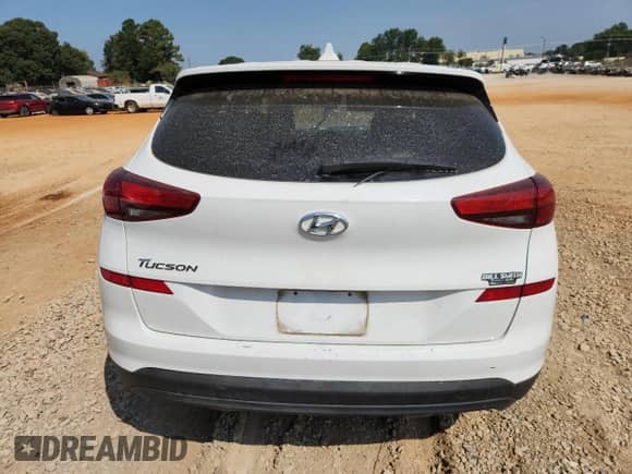 2019 Hyundai Tucson SE с VIN KM8J23A46KU842883, выставлен на аукционе Copart как лот 81144025 с пробегом 74 595 миль миль и Списание • Salvage title. История ставок и продаж доступна на DreamBid. Изображение 6.