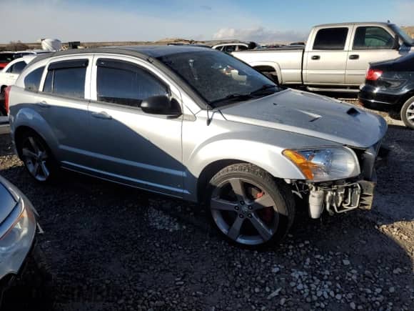 2008 Dodge Caliber с VIN 1B3HB68FX8D664451, выставлен на аукционе Copart как лот 84281964 с пробегом 118 320 миль миль и Списание • Salvage title. История ставок и продаж доступна на DreamBid. Изображение 4.