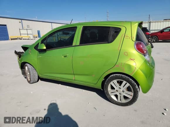 2014 Chevrolet Spark LS with VIN KL8CB6S94EC565436, listed as a Copart auction lot 86057295 with 106,927 mi miles and Salvage title. Bid and sale history available at DreamBid. Image 2.