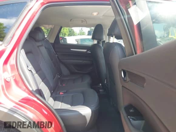 2023 Mazda CX-5 S Carbon Edition z VIN JM3KFBCM4P0239778, wystawiony jako IAAI lot #42856157 z przebiegiem 17 778 mil mil oraz . Historia ofert i sprzedaży dostępna na DreamBid. Obrazek 8.