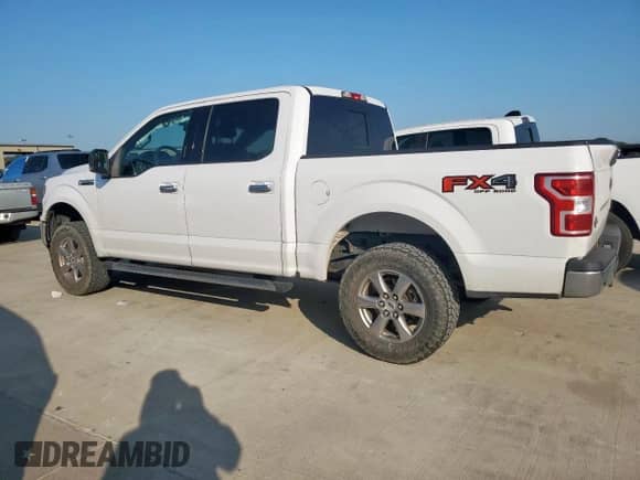 2018 Ford F-150 XL with VIN 1FTEW1E56JKF16271, listed as a Copart auction lot 80072925 with 233,901 mi miles and Salvage title. Bid and sale history available at DreamBid. Image 2.