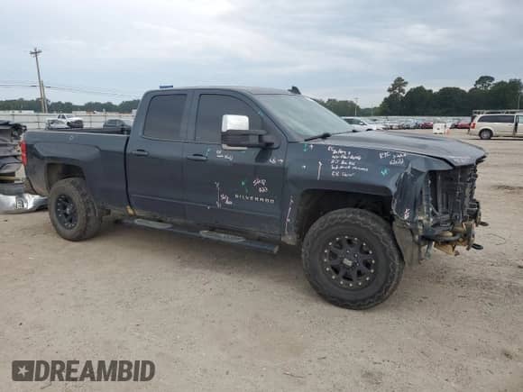 2018 Chevrolet Silverado 1500 LT with VIN 1GCVKREH2JZ127946, listed as a Copart auction lot 70167575 with 170,702 mi miles and Salvage title. Bid and sale history available at DreamBid. Image 4.