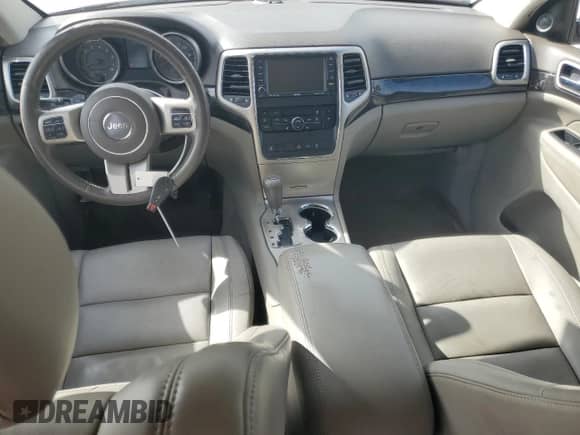 2011 Jeep Grand Cherokee 70th Anniversary z VIN 1J4RR4GG3BC504917, wystawiony jako Copart lot #82192465 z przebiegiem 212 805 mil mil oraz Czysty tytuł • Clean title. Historia ofert i sprzedaży dostępna na DreamBid. Obrazek 8.