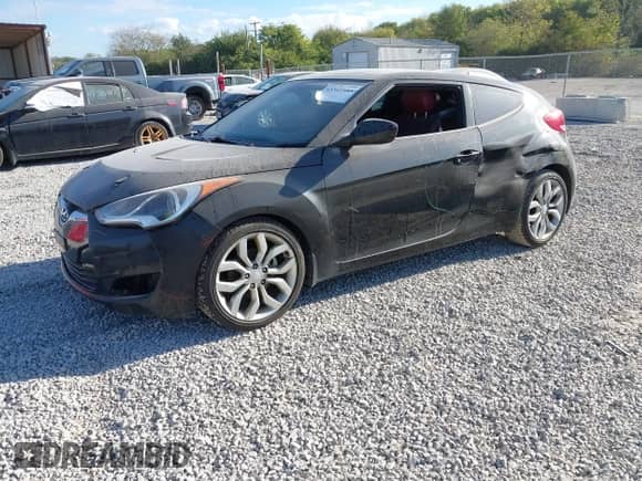 2012 Hyundai Veloster w/Black Int z VIN KMHTC6AD3CU053566, wystawiony jako IAAI lot #43349585 z przebiegiem 137 240 mil mil oraz . Historia ofert i sprzedaży dostępna na DreamBid. Obrazek 17.